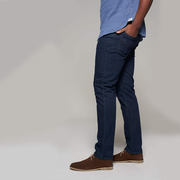 Fortmens model wearing Langley Dark Blue Jeans - side view